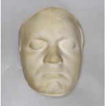 A plaster death mask, approximately 23cm high