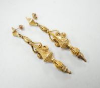 A pair of early 20th century yellow metal drop earrings, with scroll decoration, (later