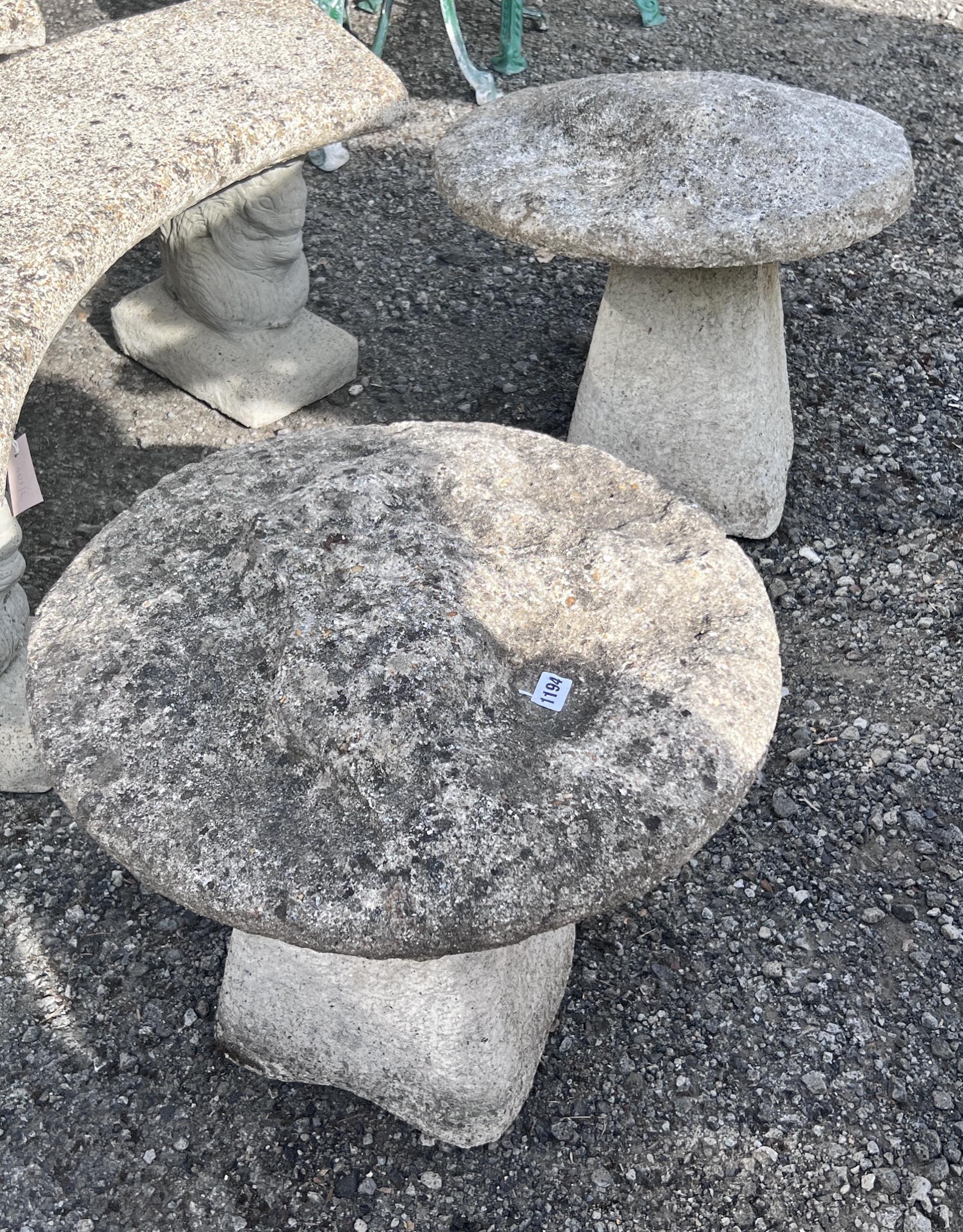 A pair of small reconstituted staddle stones, diameter 53cm, height 44cm