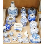 A collection of 18th - early 20th century Chinese blue and white porcelain vases, jars and spare