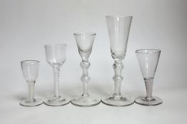 Two George II airtwist stem cordial or wine glasses, tallest 20cm high, a George III DSOT wine glass