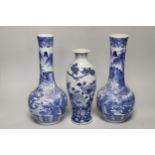 A pair of Chinese blue and white bottle vases and another vase, pair of vases 30cm high (a.f.)