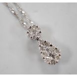 A modern 14kt white metal and pave set diamond set pear shaped pendant necklace, 52cm, gross