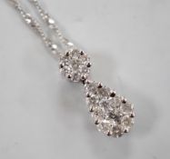 A modern 14kt white metal and pave set diamond set pear shaped pendant necklace, 52cm, gross