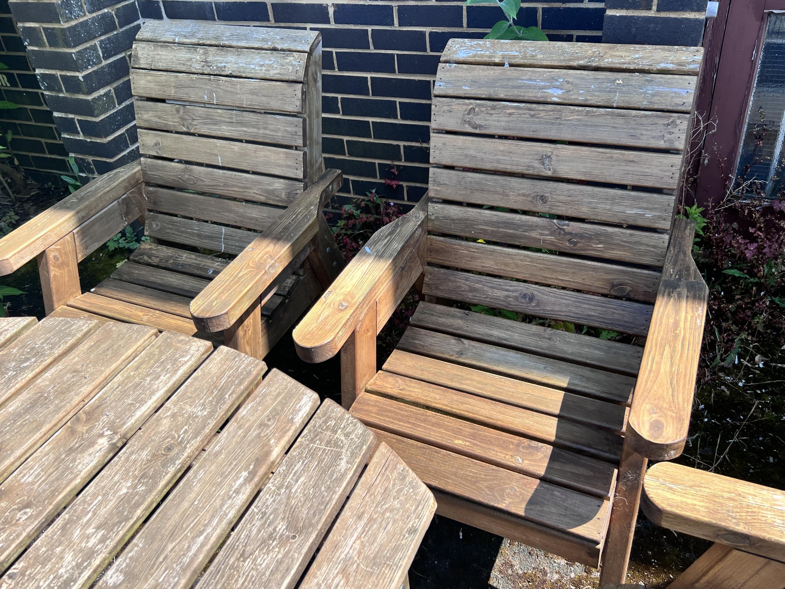 A rectangular slatted teak garden table, length 130cm, width 96cm, height 79cm, together with a pair - Image 3 of 10