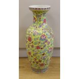 A large Chinese famille rose yellow ground baluster vase, 62cm high