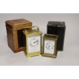 Two cased brass carriage cased clocks, one a repeating carriage clock, tallest 15cm high