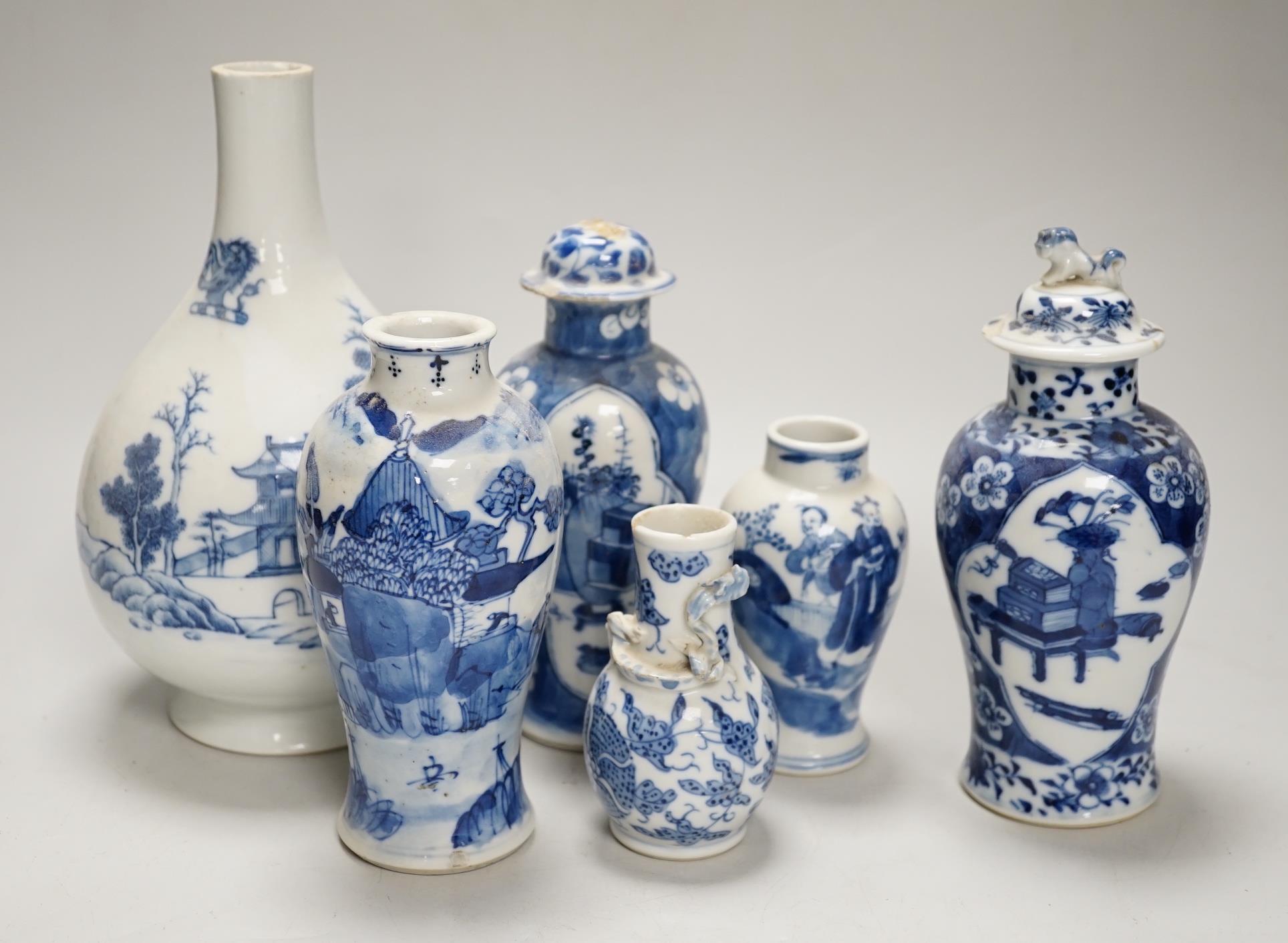 A Chinese armorial blue and white bottle vase, Qianlong/Jiaqing period, and five assorted 19th