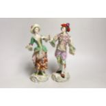 A pair of Continental porcelain figures, 23cm high