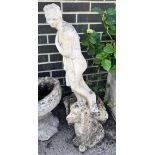 A reconstituted stone female bather garden ornament, height 78cm, together with a stone seated dog