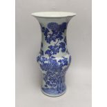 A Chinese blue and white gu shaped vase, 37.5cm high (a.f.)