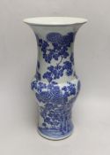 A Chinese blue and white gu shaped vase, 37.5cm high (a.f.)