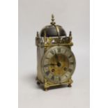 An early 20th century lantern style mantel timepiece, 21cm