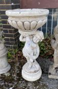 A faux marble cherub garden fountain, height 90cm