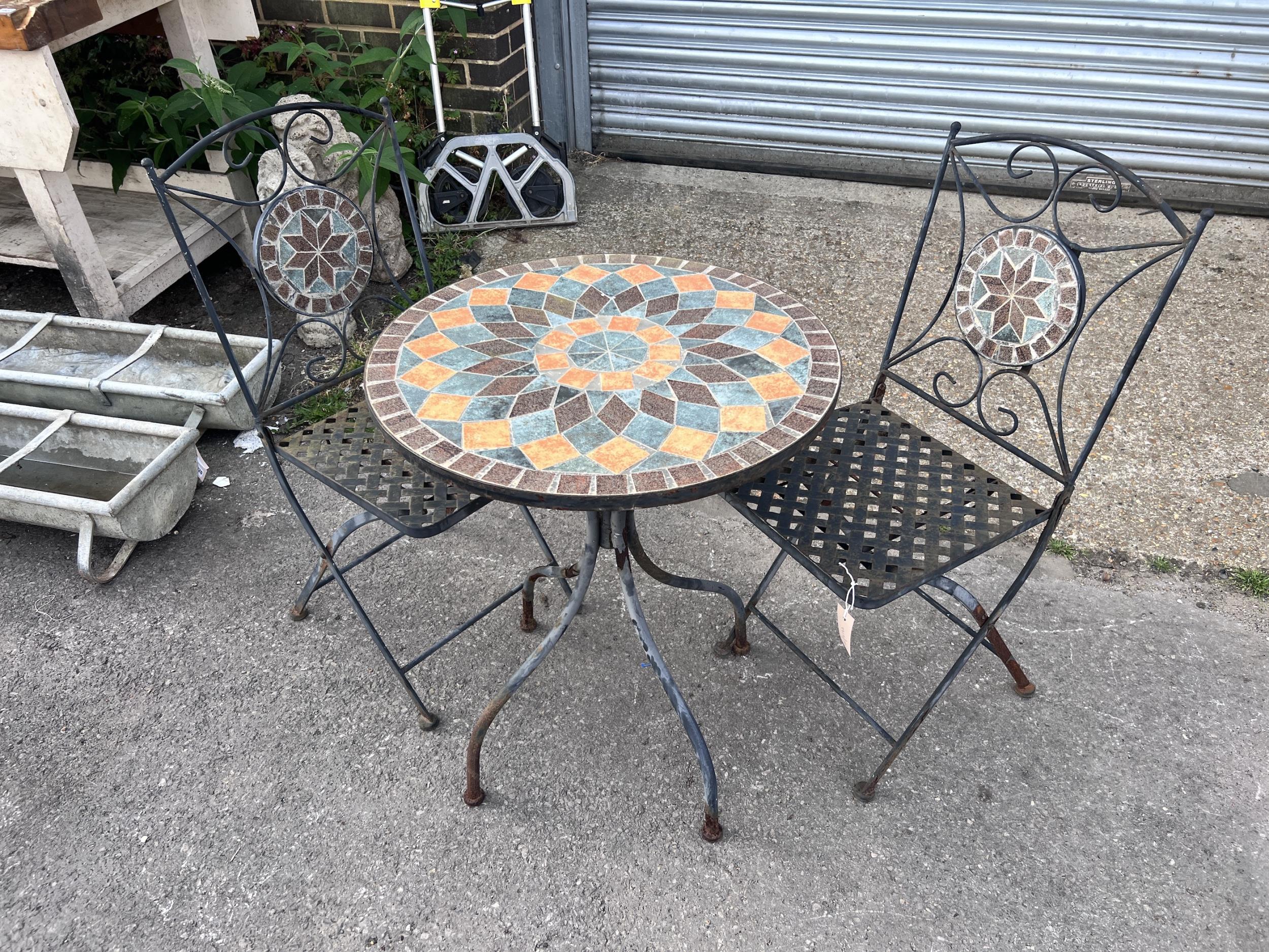 A circular mosaic topped garden table, diameter 60cm, height 73cm, and a pair of matching folding - Image 9 of 9