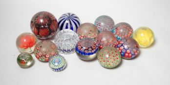 A group of assorted glass paperweights, including a Perthshire type close-packed millefiori