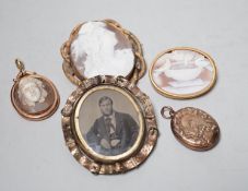 Three assorted gilt metal mounted cameo shell brooches, including bust and The Pliny Doves,