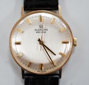 A gentleman's 9ct gold Marvin Revue manual wind wrist watch, with Marvin box.