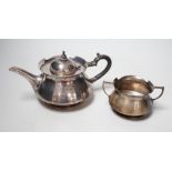 An Edwardian Art Nouveau silver teapot and two handled sugar bowl by Mappin & Webb, London, 1907,