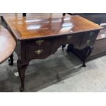 A Queen Anne revival feather banded walnut kneehole dressing table, width 129cm, depth 58cm,