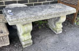 A reconstituted stone garden bench seat, length 98cm, depth 36cm, height 44cm