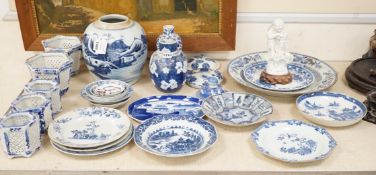 A large collection of Chinese blue and white export plates, a blanc de chine figure, two vases, a