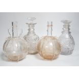 Two Dutch wheel engraved glass flasks and two Regency cut glass decanters, flasks 23cm high (4)