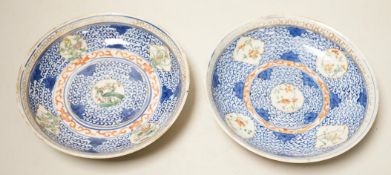 A pair of Chinese porcelain saucer dishes, 14.5cm diameter