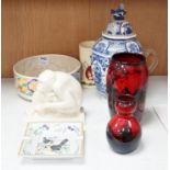 Two Royal Doulton flambé vases, a Wedgwood monkey, a Clarice Cliff bowl, a Crown Devon musical