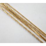 An 18ct gold fine baton link chain, 38cm and one other 750 chain, 7.3 grams and one 14kt chain, 0.