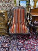 A Regency mahogany elbow chair with contemporary striped fabric upholstery, width 66cm, depth