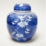 A 19th/20th century Chinese blue and white prunus jar and cover, 22cm