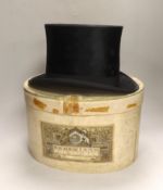 A boxed W.G. Armitage top hat