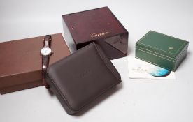 A Rolex watch box, Zenith watch box, Cartier watch box and a gentleman's early 20th century silver