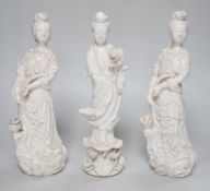 Three Chinese blanc de chine figures of Guanyin, 25cm