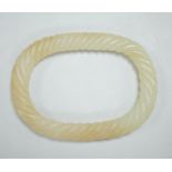 A Chinese pale celadon jade rope twist bangle, 8.3cm wide