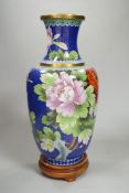 A Chinese cloisonné enamel vase on stand, 35cm high including stand