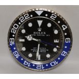 A Rolex style advertising quartz wall clock, 34cm diameter