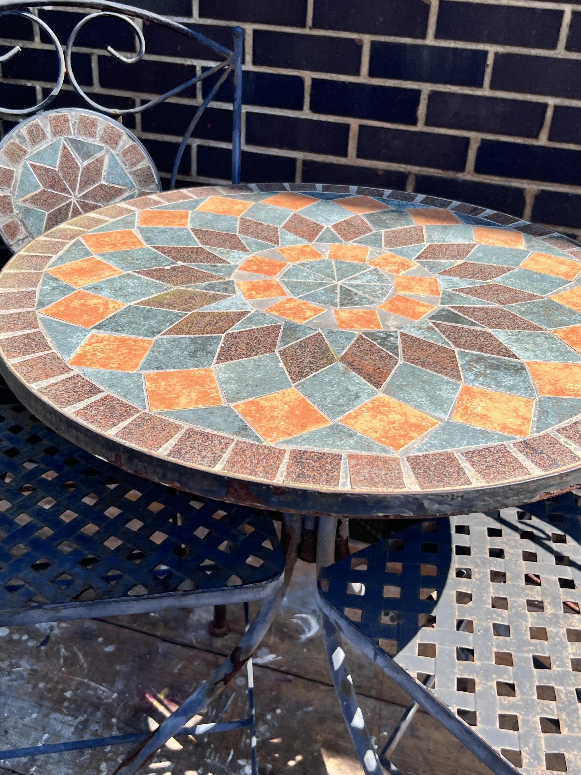 A circular mosaic topped garden table, diameter 60cm, height 73cm, and a pair of matching folding - Image 3 of 9