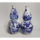 A pair of 19th century Chinese blue and white double gourd vases, 26cm high (a.f.)