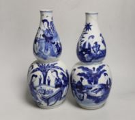 A pair of 19th century Chinese blue and white double gourd vases, 26cm high (a.f.)