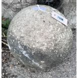 A stone cannon ball garden ornament, height 24cm