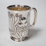 An Art Nouveau silver christening mug, Thomas Hayes, Birmingham, 1904, 89mm.