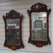 Two George III style inlaid mahogany fret cut wall mirrors, larger width 52cm, height 90cm