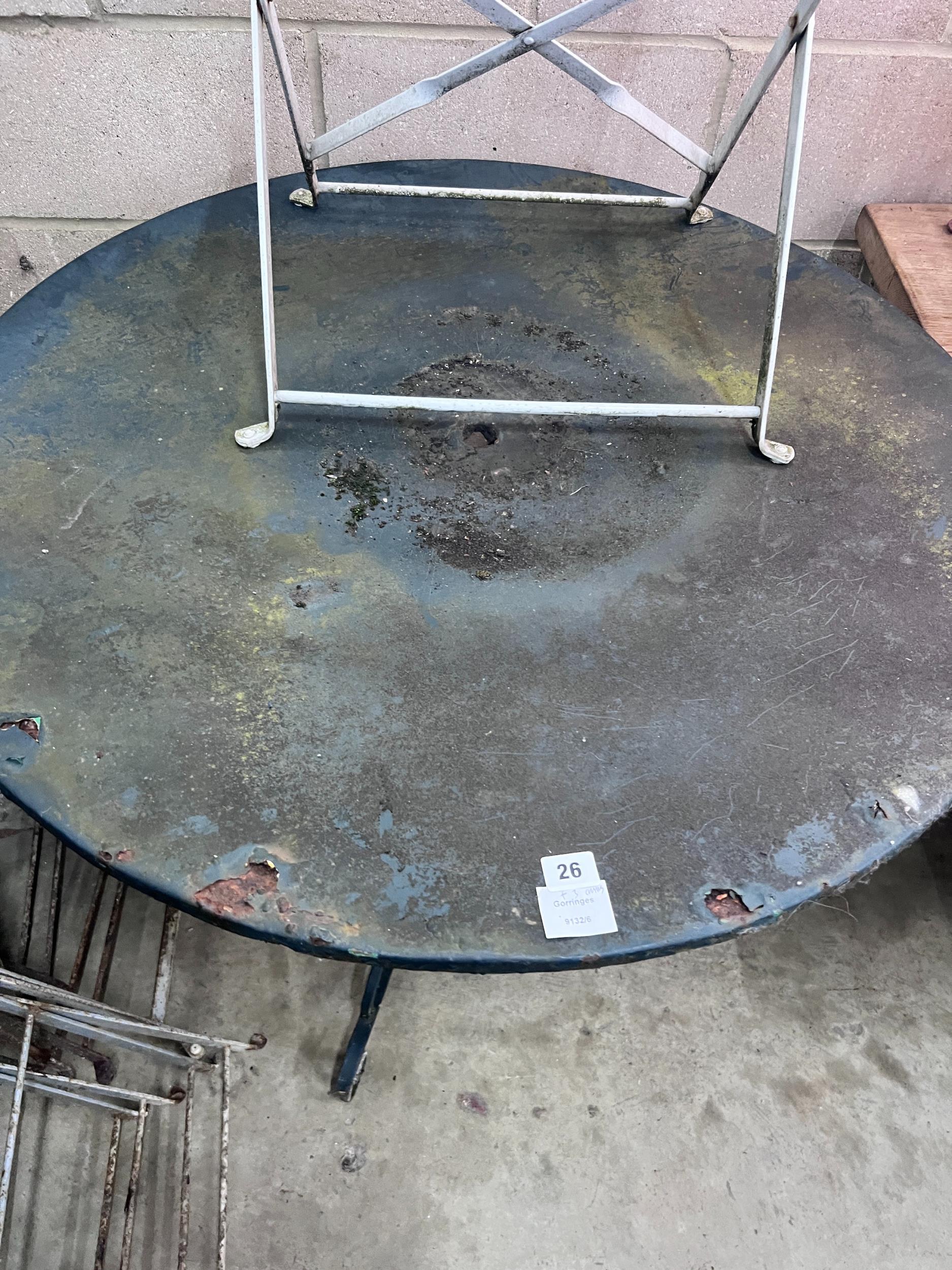 A circular metal and wrought iron garden table, diameter 90cm, and three chairs - Image 2 of 4