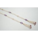 A 19th century Indian multi strand seed pearl and oval cut amethyst set long necklace, with gem