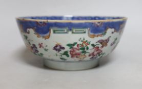 A Chinese famille rose bowl, Qianlong period, painted with insects amongst flowers, 23cm in