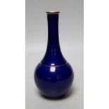 A Sevres blue glazed bottle vase, date code for 1924, 17cm