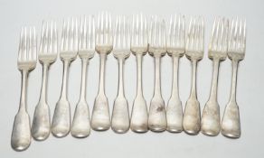 A set of twelve George III silver fiddle pattern table forks, William Eaton? London, 1812,14/15,