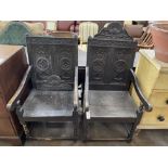 A pair of Victorian carved oak wainscot type chairs, width 56cm, depth 60cm, height 96cm